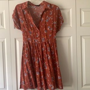 A Large, Bebop midi dress, in color burnt orange.